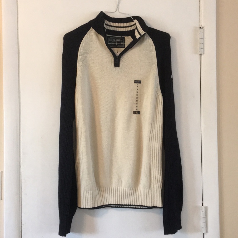 Nautica brand sweater. Cream and blue size medium.